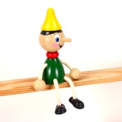 Pinocchio - wooden sitting figure