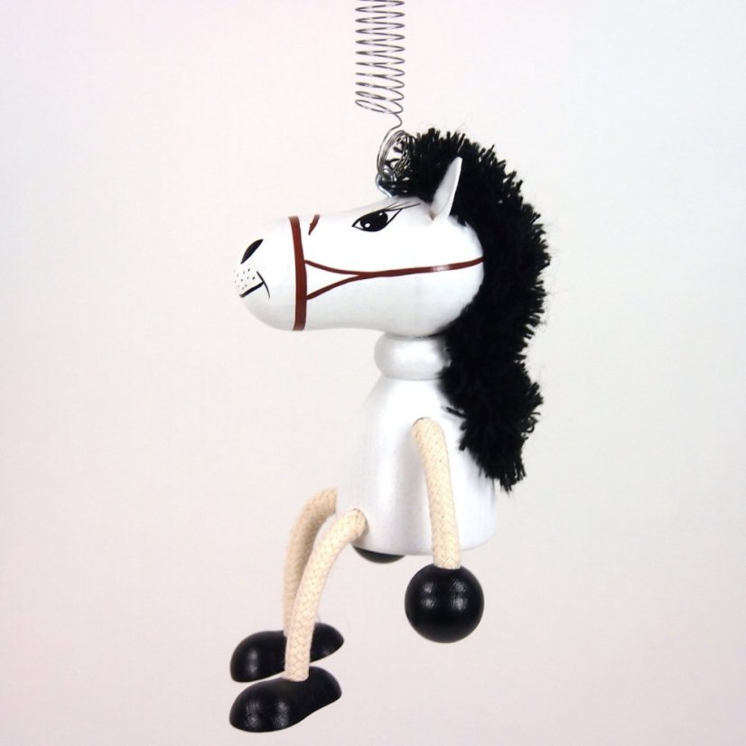 White horse - wooden figure on spring